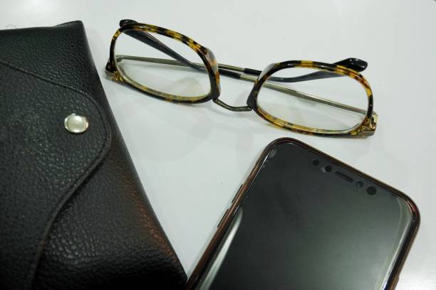 istock Glasses and smartphones are placed turned off 1742015724