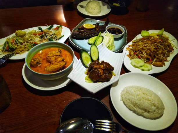 istock Grilled Fish, Vegetables,  Curry, Noodles and Rice 1742029938