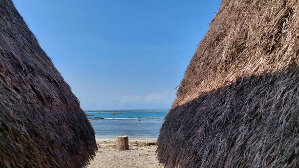 istock Binuangeun Beach in Banten with a resting place for visitors. 1742030992