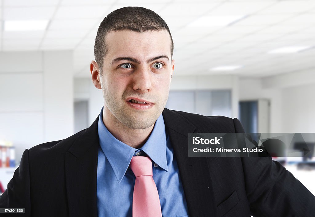 Angry businessman Portrait of an angry businessman Adult Stock Photo