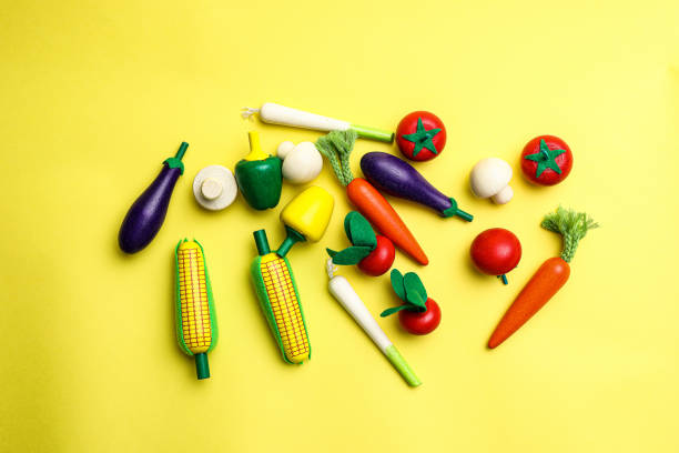 istock Fun and cute fruit children's toys. Yellow Background 1742052037