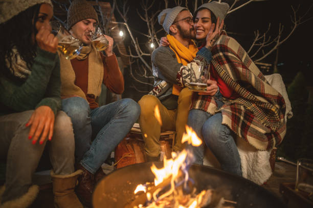 istock Friends enjoying by the campfire 1742065079