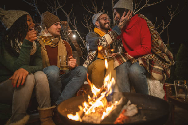 istock Friends enjoying by the campfire 1742066129