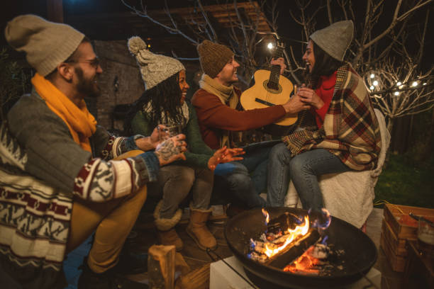 istock Happy friends around the Fire 1742072548