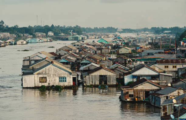 Chau Doc, Vietnam - Sep 3, 2017. Floating houses on Mekong River in Chau Doc, Vietnam. Chau Doc is a city in the heart of the Mekong Delta, in Vietnam.