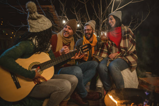 istock Happy friends around the Fire 1742081101