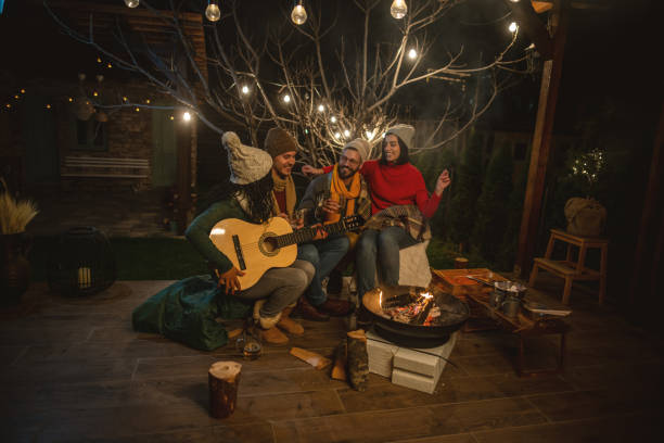 istock Happy friends around the Fire 1742092511