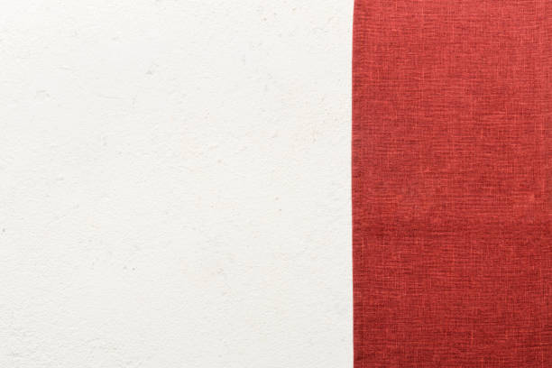 istock top view with red empty kitchen napkin isolated on table background. Folded cloth for mockup with copy space, Flat lay. Minimal style 1742123241