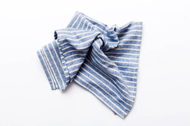 istock top view with blue kitchen napkin isolated on table background. Folded cloth for mockup with copy space, Flat lay. Minimal style 1742123388