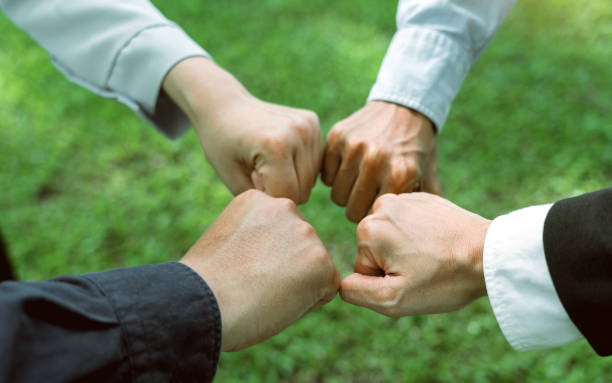 istock Group of volunteer people joining for cooperation about global community teamwork with join hand together, World environment day, sustainable development goal. 1742126718