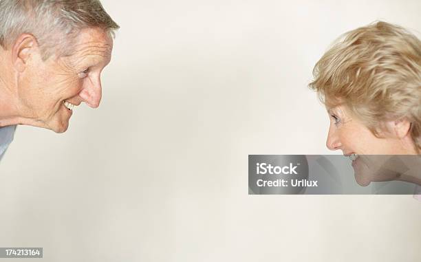 Lovely Old Couple Smiling And Looking At Eachother Stock Photo - Download Image Now - Adult, Adults Only, Beautiful People