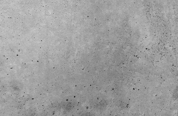 istock Gray cement texture stone concrete, plastered stucco wall; painted flat fade pastel background white grey solid floor grain. Rough top beige empty brushed print sand brick sepia home dirty 1742131802