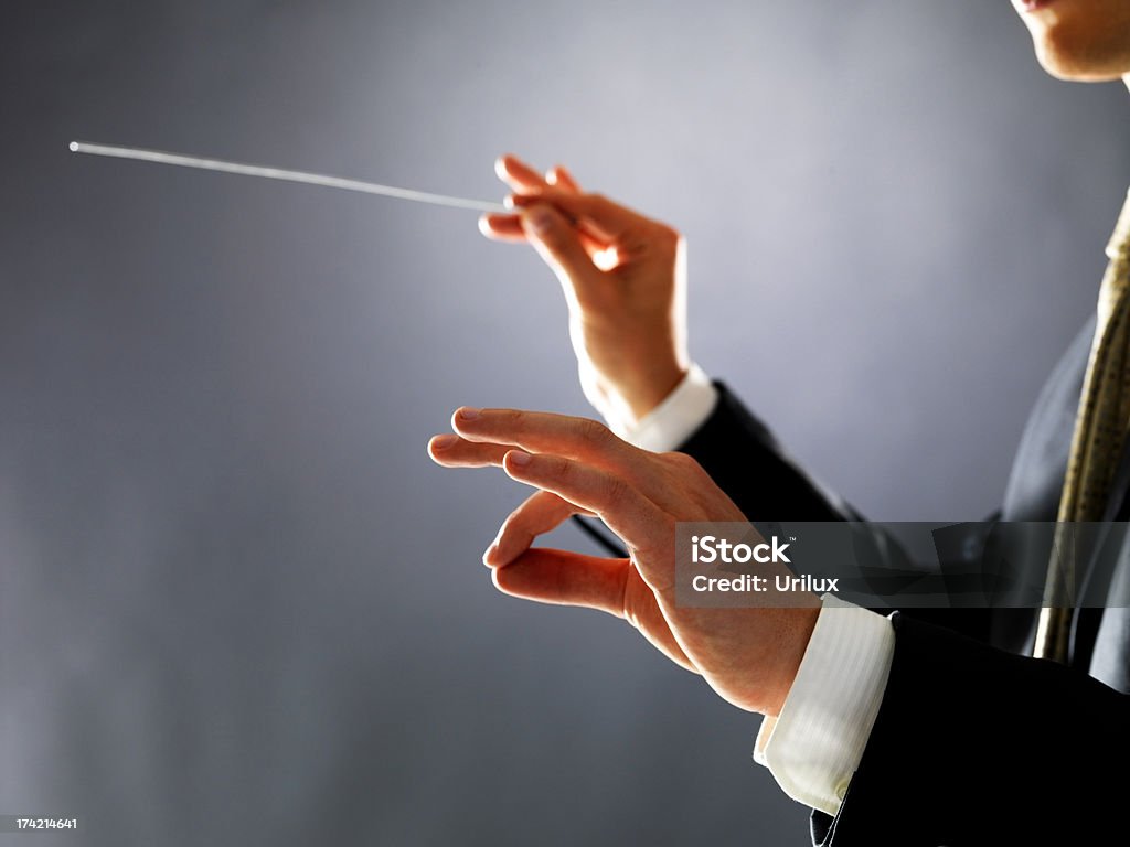 Keeping perfect time  Musical Conductor Stock Photo