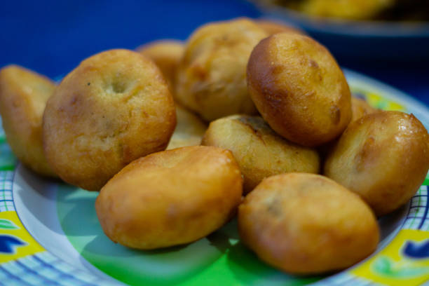 istock Potato donuts on a plate - stock photo 1742147905