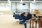 Bench vice installed on table equipment for carpentry work