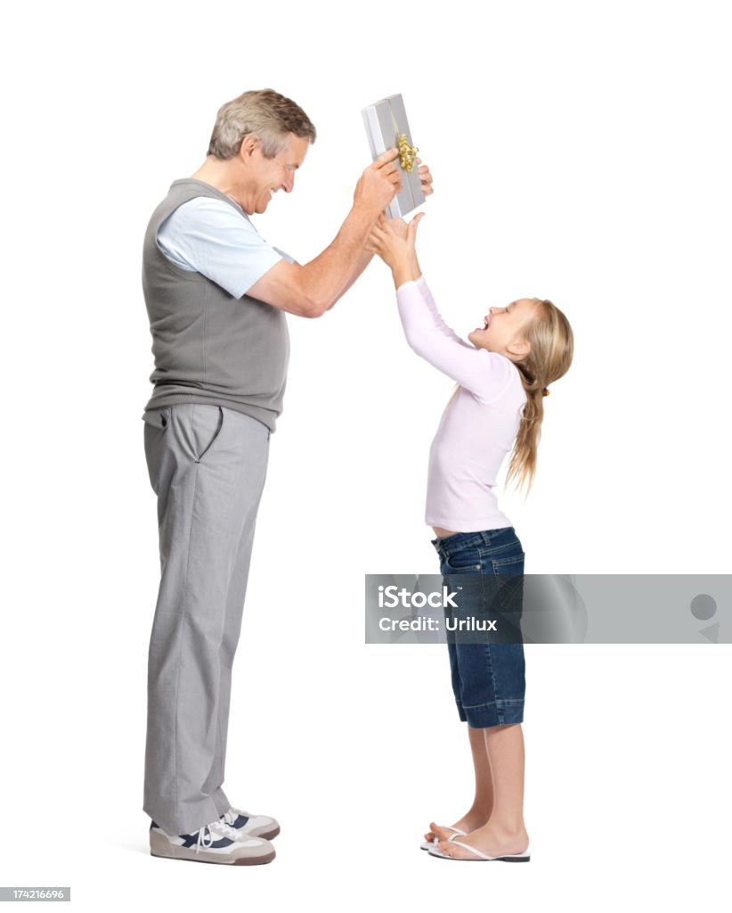 Fun - Old man giving gift to his granddaughter  Adult Stock Photo