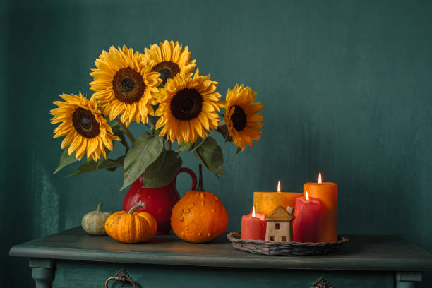istock Autumn pumpkins and sunflowers 1742168990