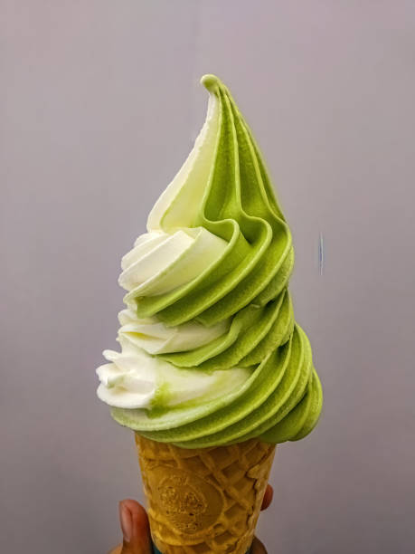 istock a matcha and vanilla ice cream cone 1742228387