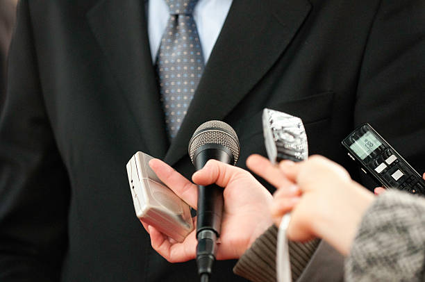 istock Businessman in media interview 174225096