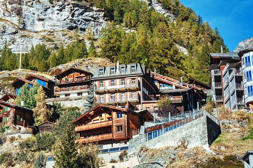 low angle view on typical traditional hotels in Zermatt in the swiss alps