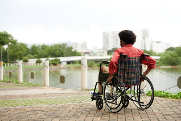 istock Man in Wheelchair Spending Time on River Bank 1742269964