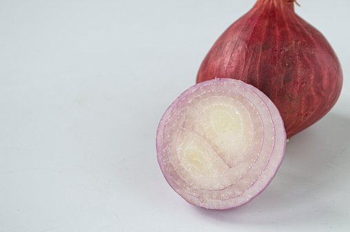 Chopped of red onion and garlic. Chopped red onion and garlic background. Slice of red onion and garlic. Food preparation background. Top view.