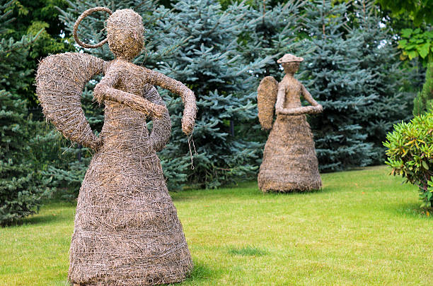 Scarecrow of straw in the form  an angel stock photo