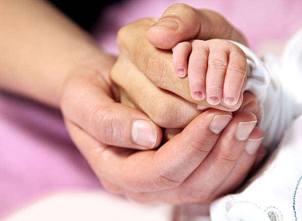 istock Hands of a family 174228411