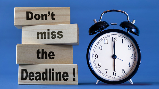 Dont miss the deadline, text words typography written on wooden blocks, business education and self development concept