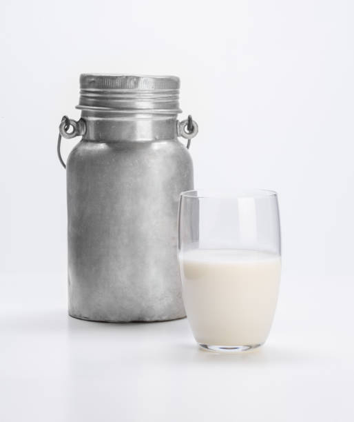 istock milk in glass glass and can, on white background 1742323193