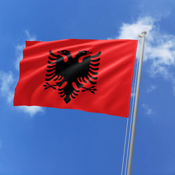 3d illustration flag of Albania. Albania flag isolated on the blue sky with clipping path.