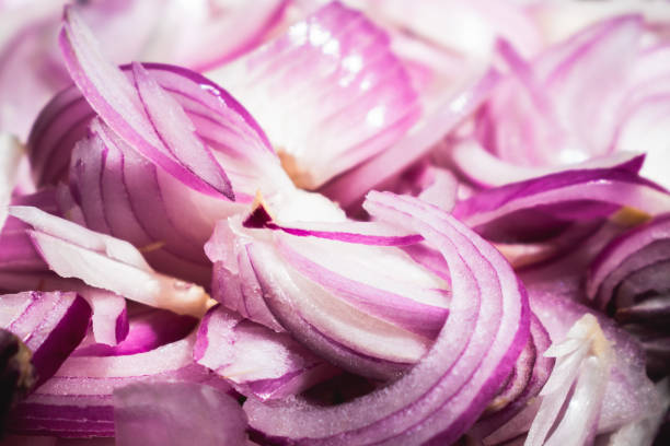 istock Sliced red onion as background. Selective focus. Shallow depth of field. 1742325485