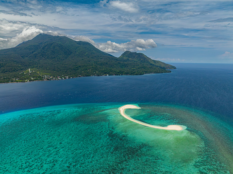 White Island in Camiguin and turquoise water and corals. Philippines. Travel destination.