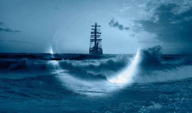 istock Sailing old ship in a storm sea with crescent moon stormy clouds in the background 1742337191