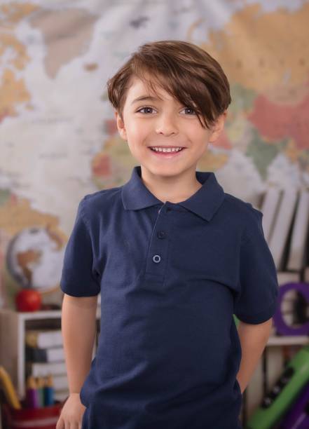 istock a young boy is in front of a large map wall 1742356108