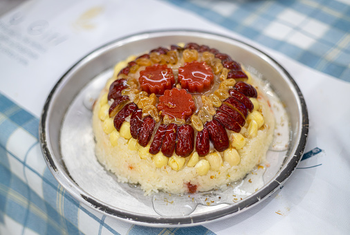 Make traditional Chinese traditional steamed cake. Red date glutinous rice cake.