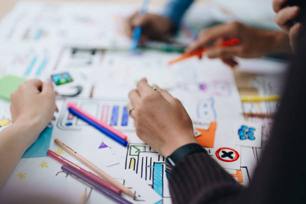 istock Team of Creative Web, Graphic Designer planning for mobile phone, drawing website ux ui app for mobile phone application and development template layout, process to developing prototype wireframe. 1742373308