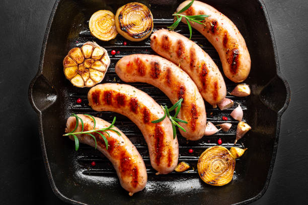 istock Grilled sausages with vegetables and rosemary 1742386043
