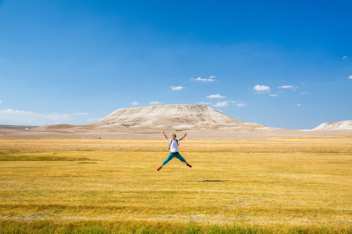 One backpacker on a steppe.