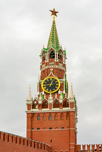 Sunny spring day in Moscow. Moskvoretskaya embankment. Blue sky with fluffy clouds is on the background.