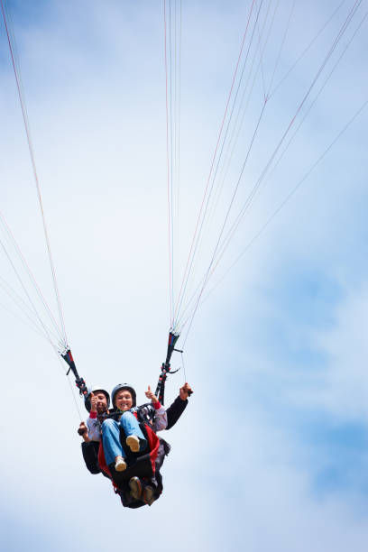 istock Thumb's up for paragliding 174240381