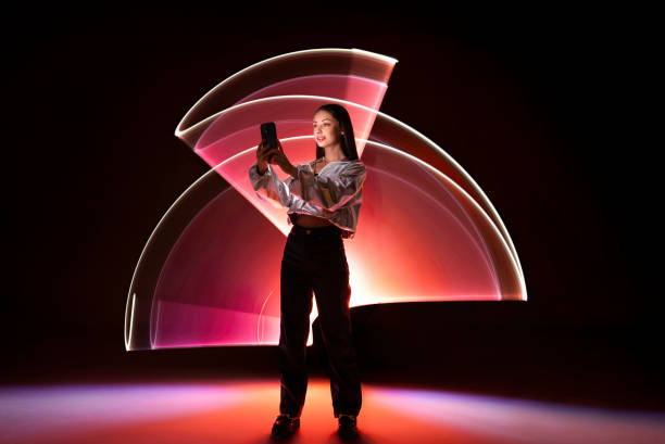 istock Young woman using a smart phone 1742406051