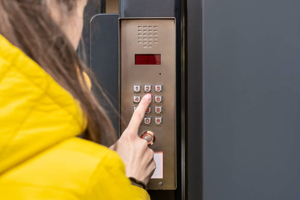 istock Entrance Doorbell in Multi-Apartment Building. 1742407174