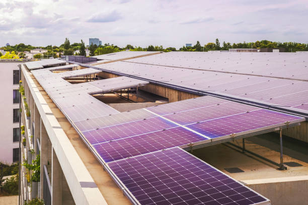 istock Solar Panels on Roof of Modern Skyscraper Building 1742407220