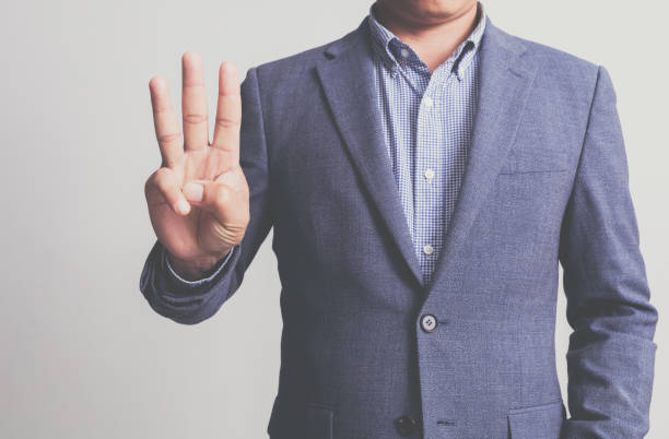 istock Businessman wearing a suit on a white background 1742418471