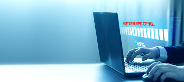 istock Updating the latest software version of the computer system via the internet network. 1742424614