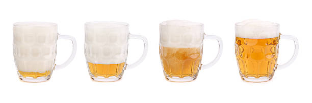istock Decreasing the foam in a mug of beer 174243133