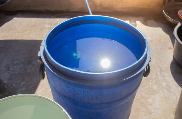istock Big blue bucket full of water 1742433651
