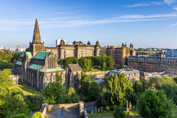 Glasgow Cathedral from the Necropolis. Glasgow Cathedral, the oldest cathedral on mainland Scotland, and the Old Royal Infirmary shot from the Necropolis Victorian Cemetery glasgow scotland stock pictures, royalty-free photos & images
