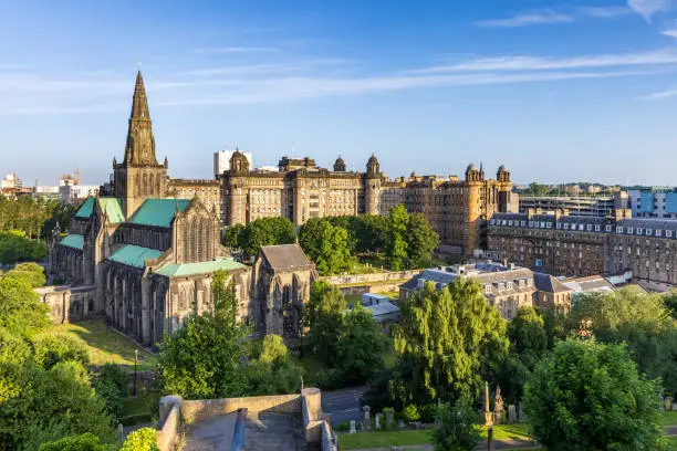Glasgow Cathedral, the oldest cathedral on mainland Scotland, and the Old Royal Infirmary shot from the Necropolis Victorian Cemetery